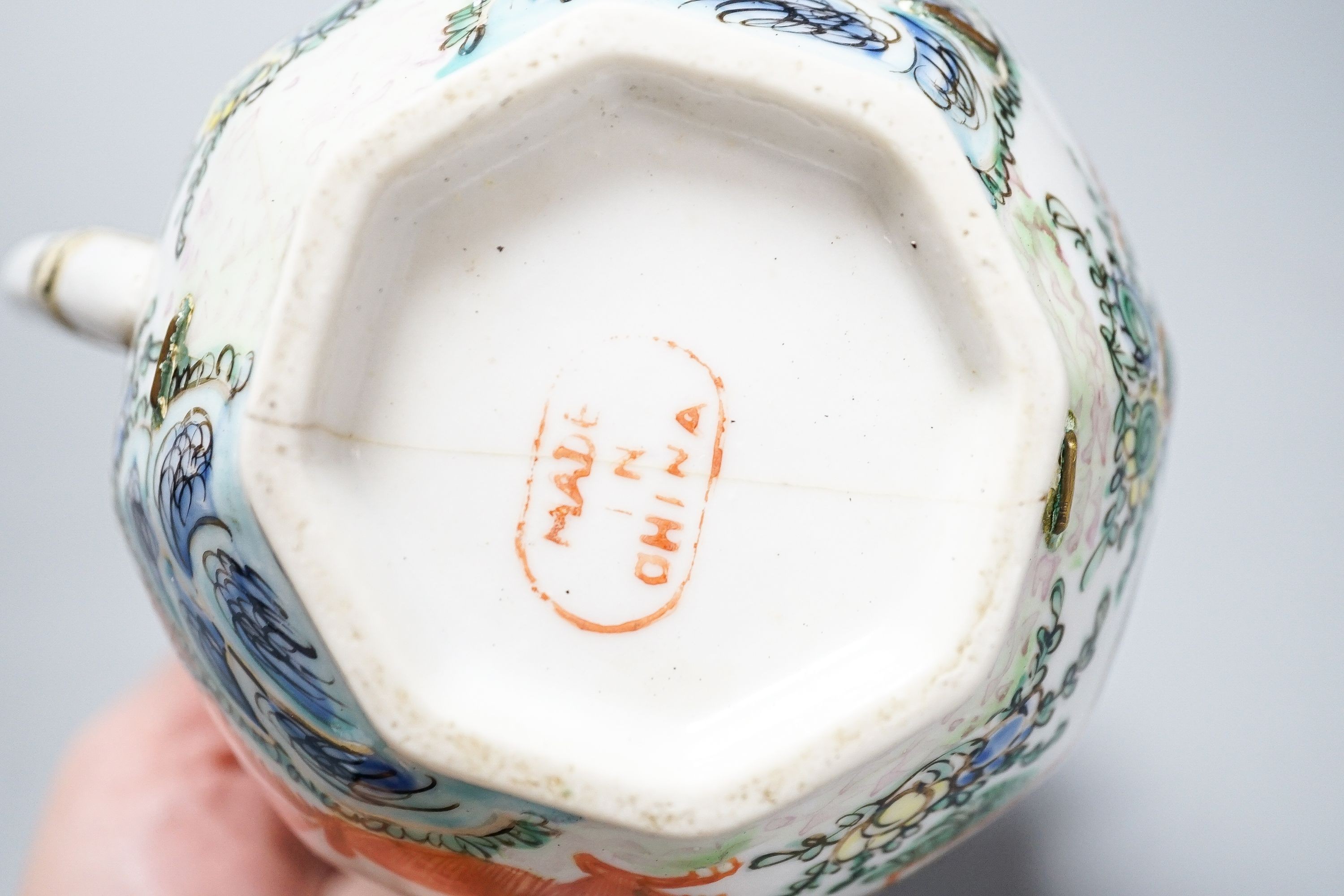 A Chinese celadon glazed vase, 24cm and a Chinese famille rose teapot and matching cream jug, a.f.
